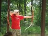 Teaching archery at girl's camp