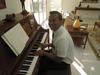 me playing the piano at the mission home