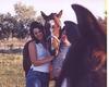 Me, my sister, and Sugar and Vinnie, our horses