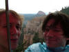 My brother and I getting drenched under a small umbrella infront of a peice of Bryce Canyon! FUNness!